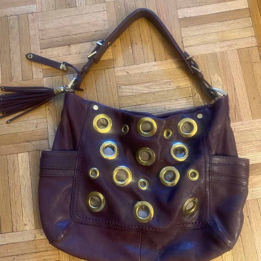 Cole Haan Elegant dark purple rare bag real Leather Handbag with Gold Accents.